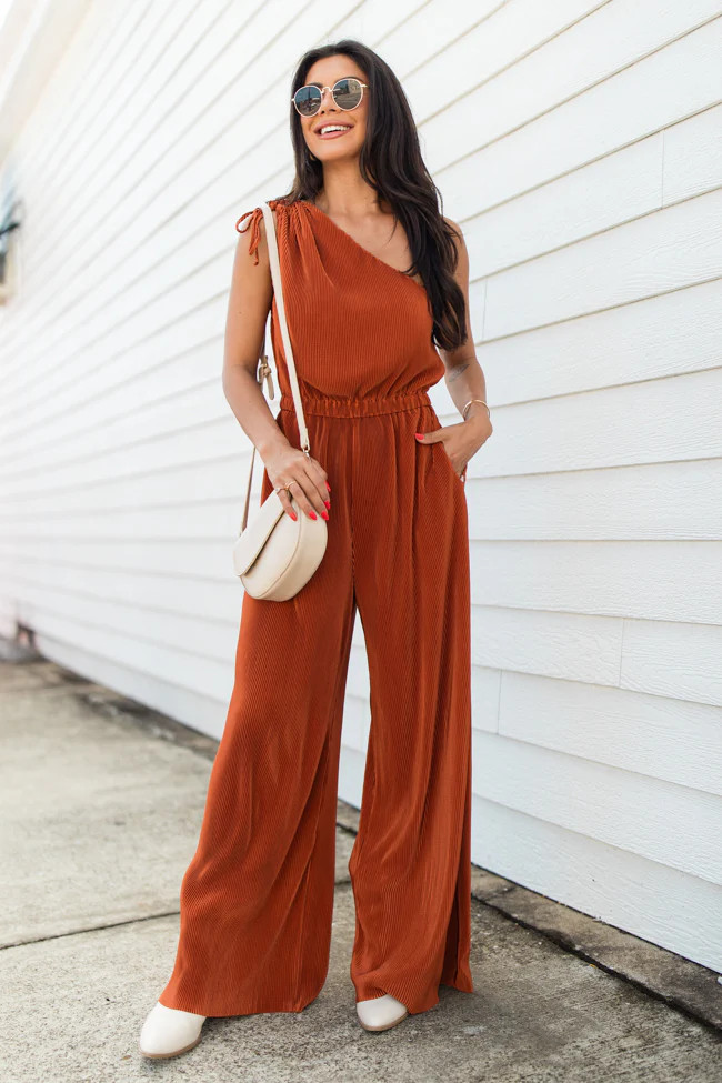 Sent From Above Rust One Shoulder Plisse Jumpsuit | Pink Lily