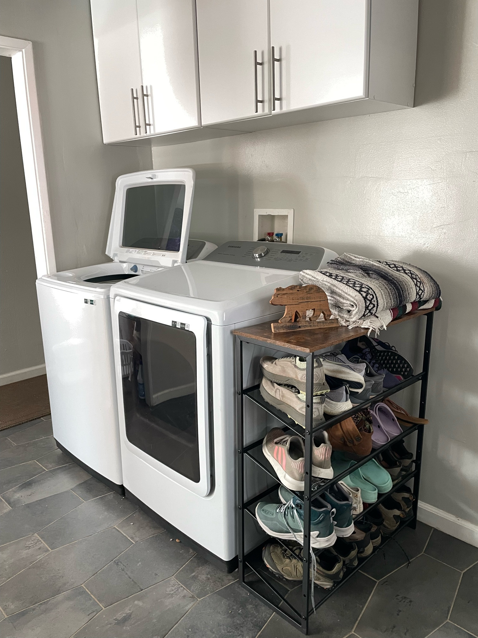 Create a minimalist bedroom that blends functionality and style! With white cabinets for storage, a sleek shoe rack for organization, and a built-in washer and dryer, this space maximizes convenience without sacrificing aesthetic. Perfect for a streamlined, clutter-free room. 

#LTKHome #LTKFamily #LTKFindsUnder100