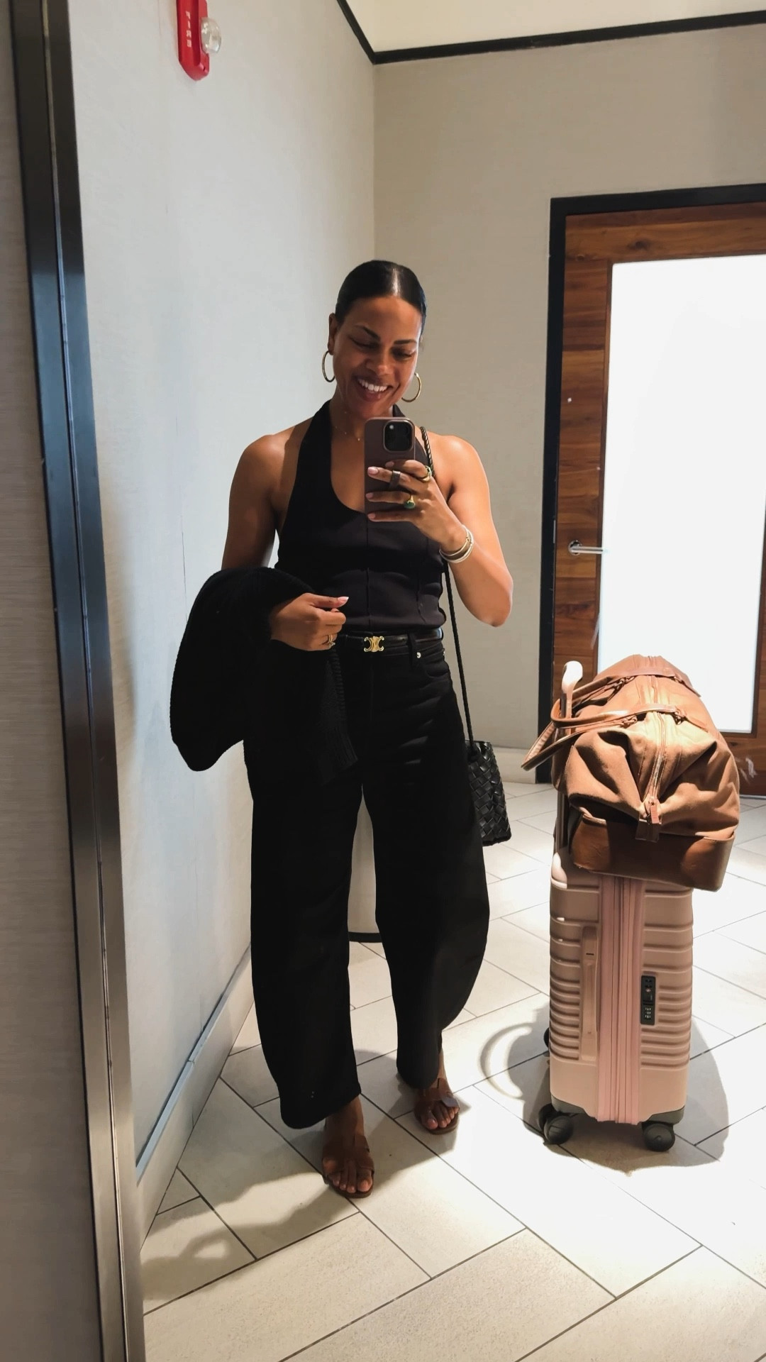 Airport outfit: barrel jeans, halter neck tank, sandals & sweater. 
Always size up in barrel jeans! Top is true to size. 

Airport outfit, travel outfit, women’s jeans, barrel jeans, halter neck tank, sweater, travel essentials, luggage. 

#LTKTravel #LTKStyleTip #LTKOver40