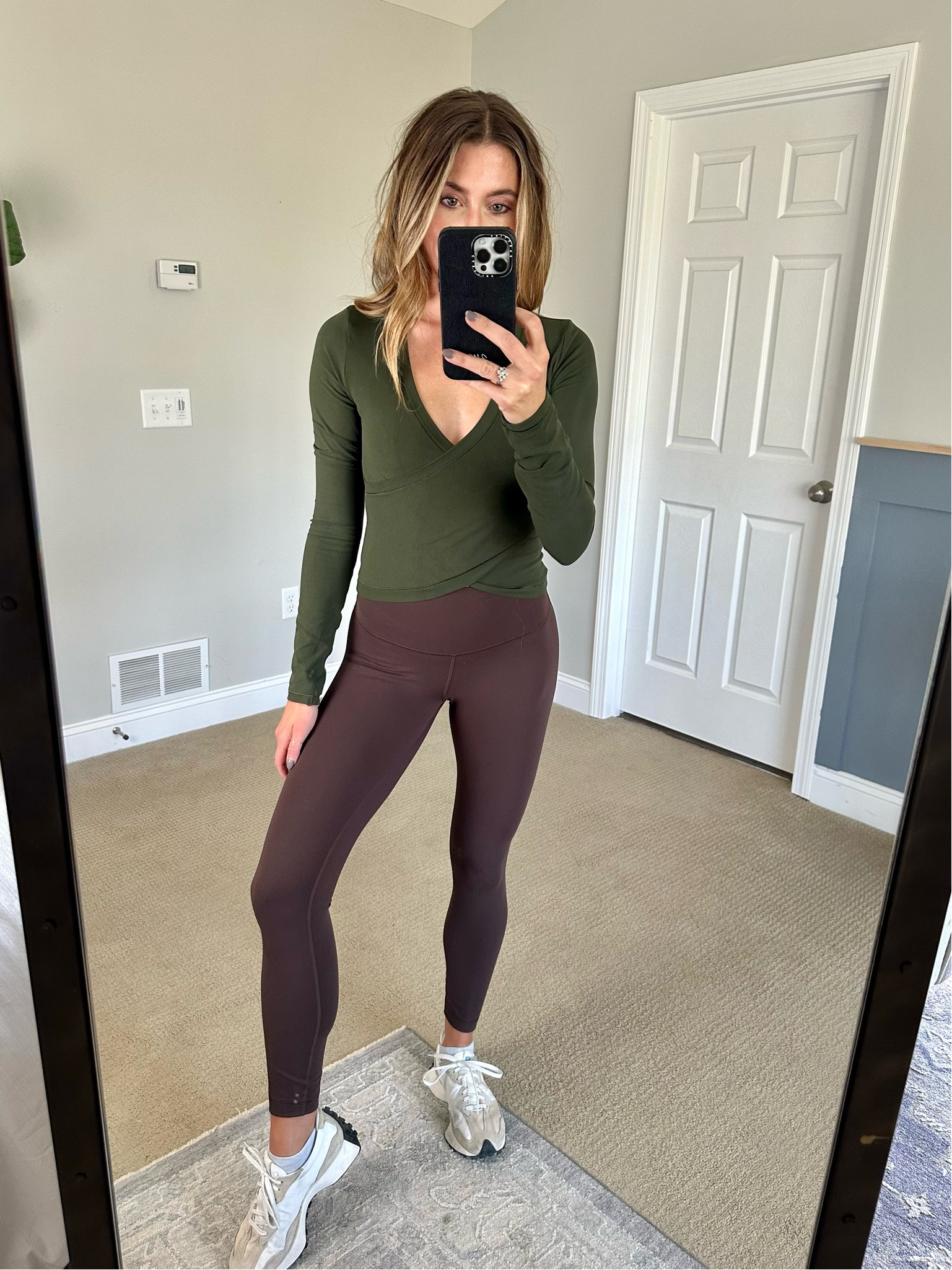 This color green has a hold on me. This wrap top is so flattering and comes in some staple neutral colors for Fall🖤

#LTKfitness #LTKstyletip #LTKover40