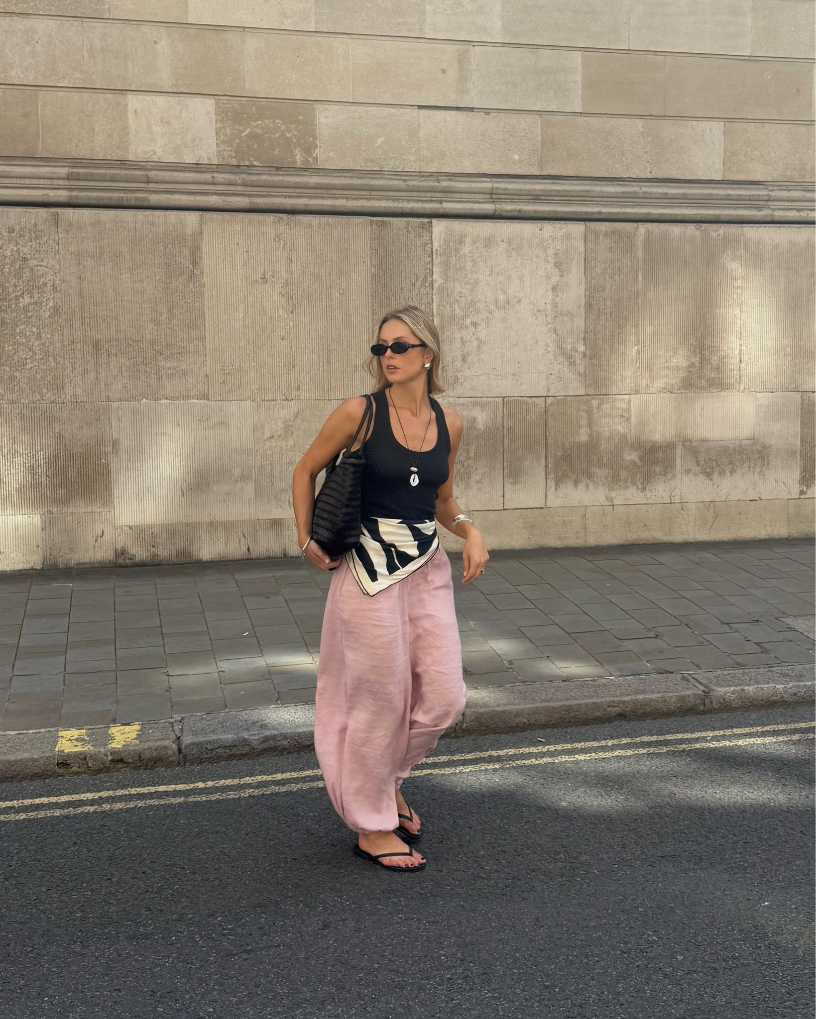 What I’m wearing whilst London thinks it’s the Med ☀️

Balloon trousers, oysho, pink trousers, linen trousers, black flip flops, silk scarf, black tank, statement necklace, black woven bag, smart casual style, summer style, heatwave outfit

#LTKuk #LTKsummer #LTKeurope