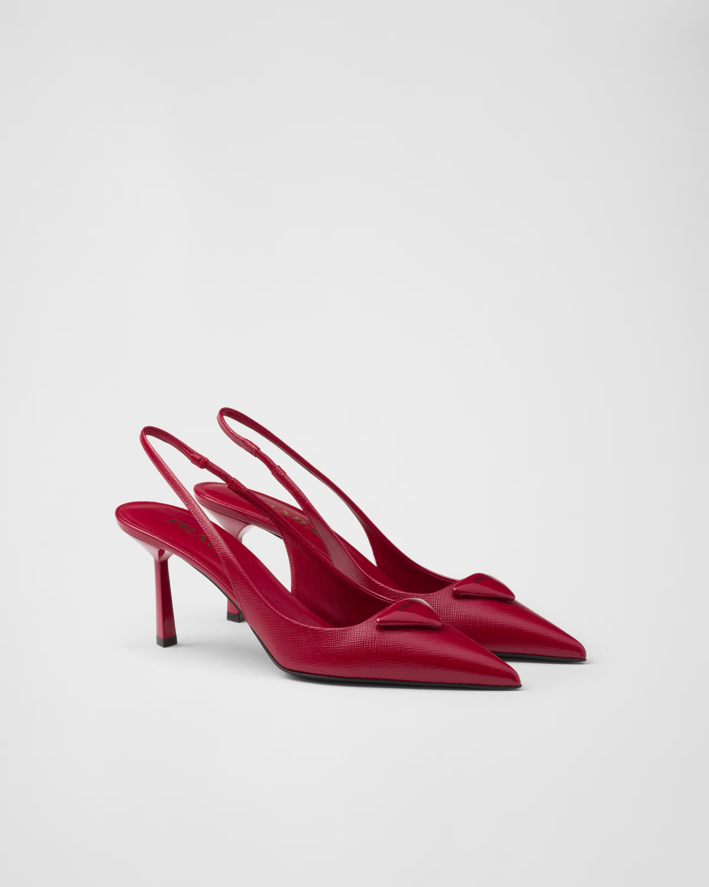 Saffiano patent leather slingback pumps$ 1,200prnux_ | Prada US