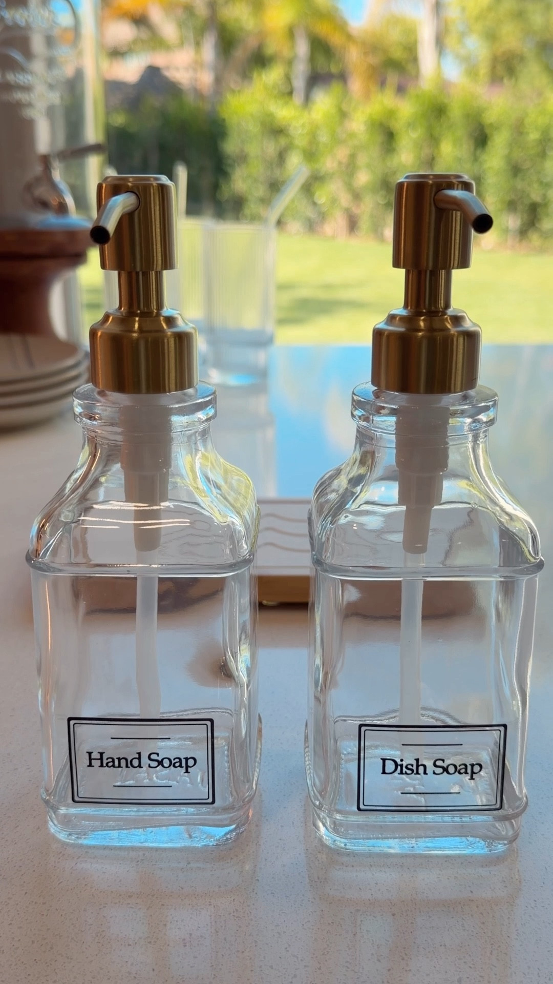 Spring refresh 
Kitchen soap dispenser 
Water absorbing tray 
Gold pump dispenser 
Glass soap dispenser 

#LTKselfcare #LTKHome #LTKSeasonal