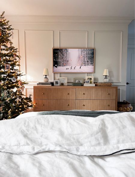 Cozy holiday bedroom!! 

This is the 43” frame tv and I’m linking along with everything else you see here. Tree is from Amazon and it’s my favorite in the house!! 

#LTKHoliday #LTKhome #LTKSeasonal