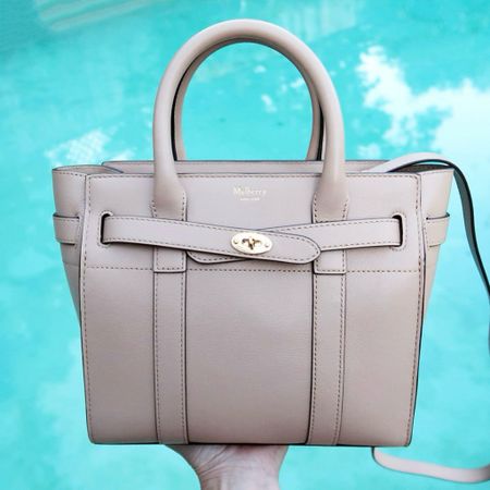 Loving this timeless and luxurious “mini” tote. It has a detachable shoulder strap and interior slip pocket. The quality is outstanding 🙌 full review on the blog 💚❤️

#LTKGiftGuide #LTKover40 #LTKitbag