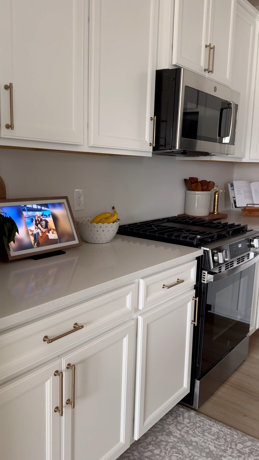 Kitchen hardware, champagne bronze hardware, champagne bronze, amazon echo, echo frame, fruit bowl, eyelet bowl, beige crock, French crock, black vase, eucalyptus stems, cookbook holder, brass salt and pepper grinders, Nespresso, syrup dispensers, wood riser, fatigue mats

#LTKfoodie #LTKHome #LTKSaleAlert
