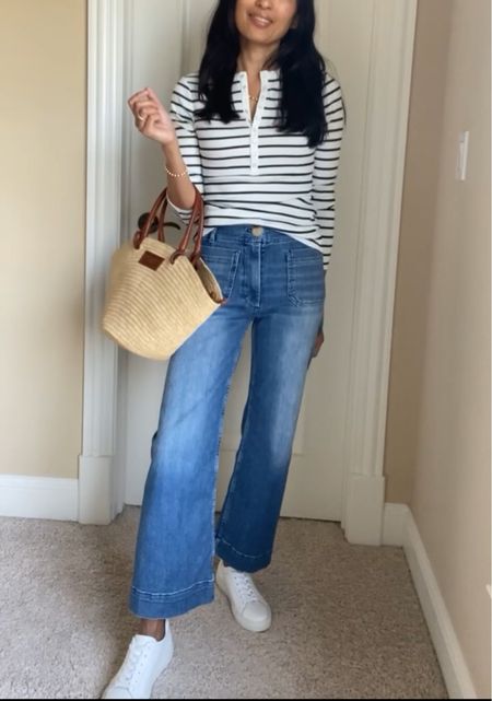 Striped henley top from @sezane. Striped top. True to size. Material feels luxe. 
Straw bucket bag. Straw tote bag. Raffiz tote bag. 
Jeans true to size. 
White sneakers  
Code HINTOFGLAM to save on jewelry  

#LTKitbag #LTKstyletip #LTKover40