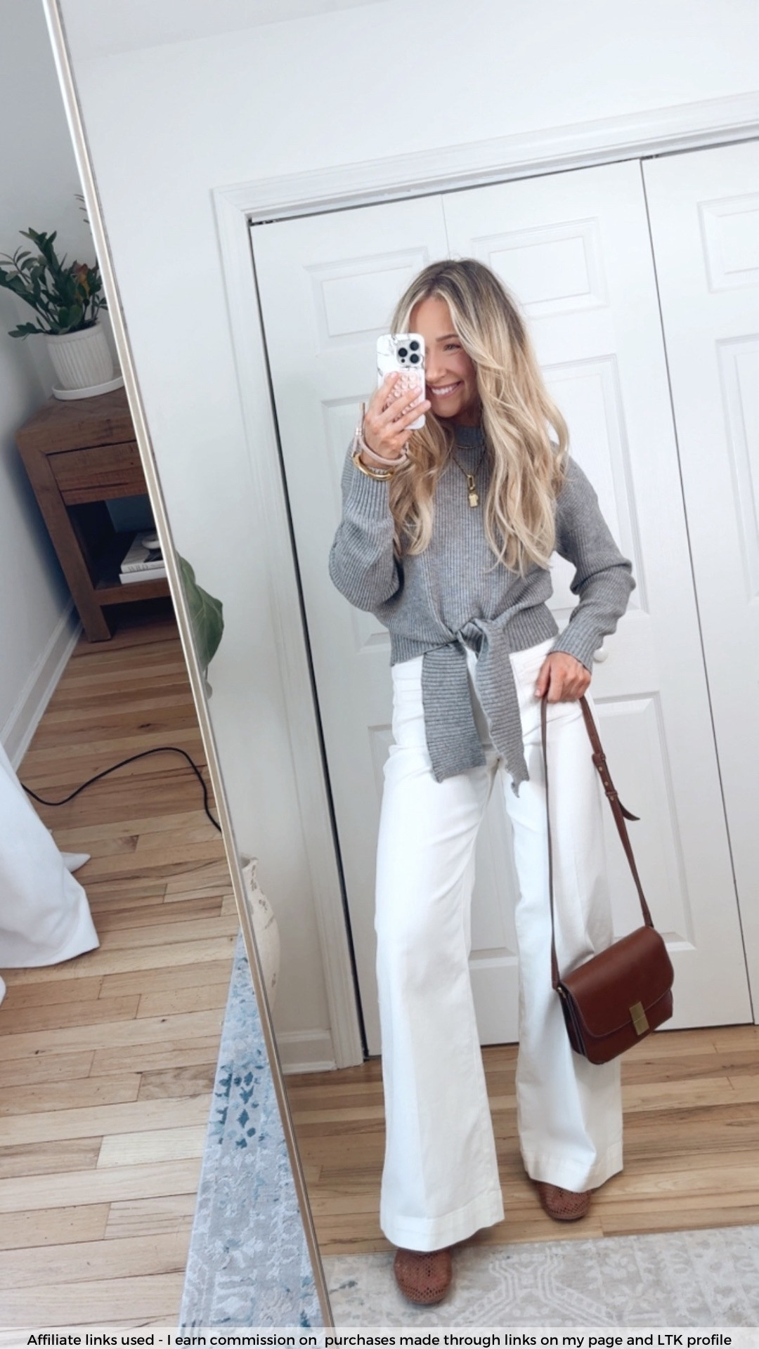 Early spring outfit with white jeans 

Amazon gray sweater 
H&M jeans 