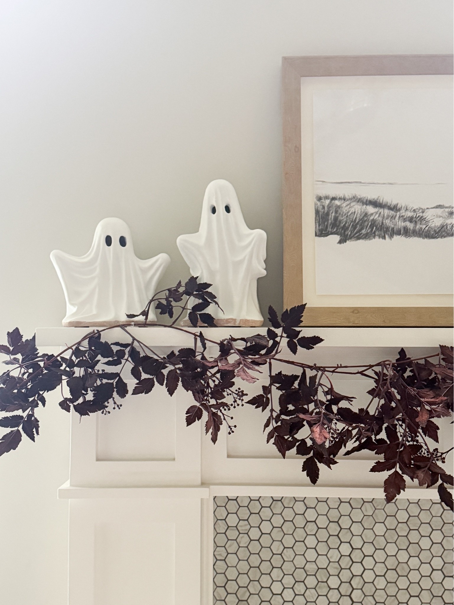 Keeping Halloween simple this year with timeless pieces & thoughtful details. Pottery Barn terracotta ghosts, Cimicifuga garland, & neutral art. A subtle nod to the season without compromising our everyday aesthetic.

Halloween mantel decor - neutral Halloween decor - elevated Halloween decorating - Pottery Barn ghosts - Afloral fall garland - McGee & Co. artwork - minimalist Halloween decor - timeless fall decor - understated Halloween decor - Halloween fireplace styling - designer inspired home decor - classic seasonal decorating - neutral fall home decor - sophisticated Halloween decor