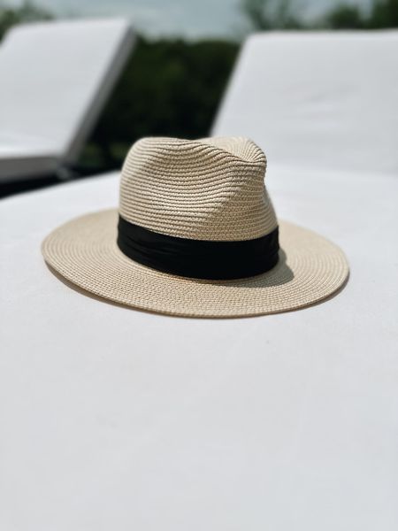 A really favorable hat for the beach! 
Fashionablylatemom 
Lanzom Women Wide Brim Straw Panama Roll up Hat Fedora Beach Sun Hat UPF50+
Made of 90% paper straw and 10 % polyester. Straw material. Soft comfortable and breathable to wear.
One Size fit most lady women,hat circumference 22.5" ; brim 2.9" ; You can adjust the size of the hat through the rope inside in the hat.

#LTKsalealert #LTKstyletip