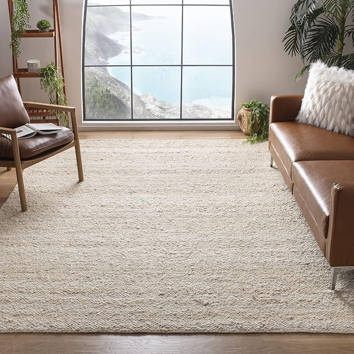 SAFAVIEH Area Rug 8x10 - Natura Collection - Large - Ivory, Handmade Wool, Ideal for Living Room, Bedroom, Dining Space (NAT263A) | Amazon (US)