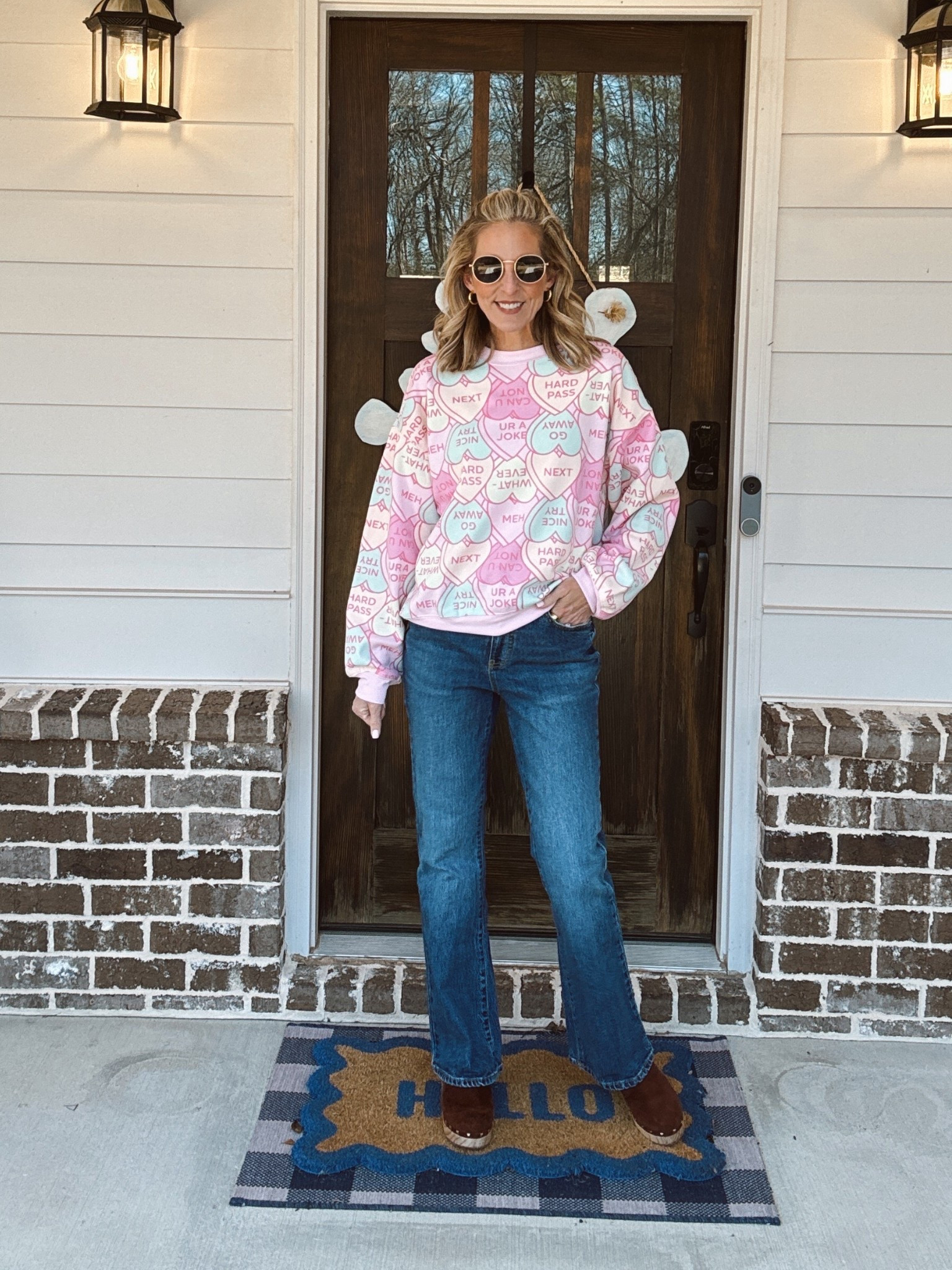 Candy hearts women’s graphic sweatshirt only $11 today I am wearing this size medium. This is for the girl who wears their heart on their sleeves so cute and perfect for the Valentine’s Day would look great with anything underneath it and your favorite Walmart jeans  

#LTKmomlife #LTKootd #LTKgrwm