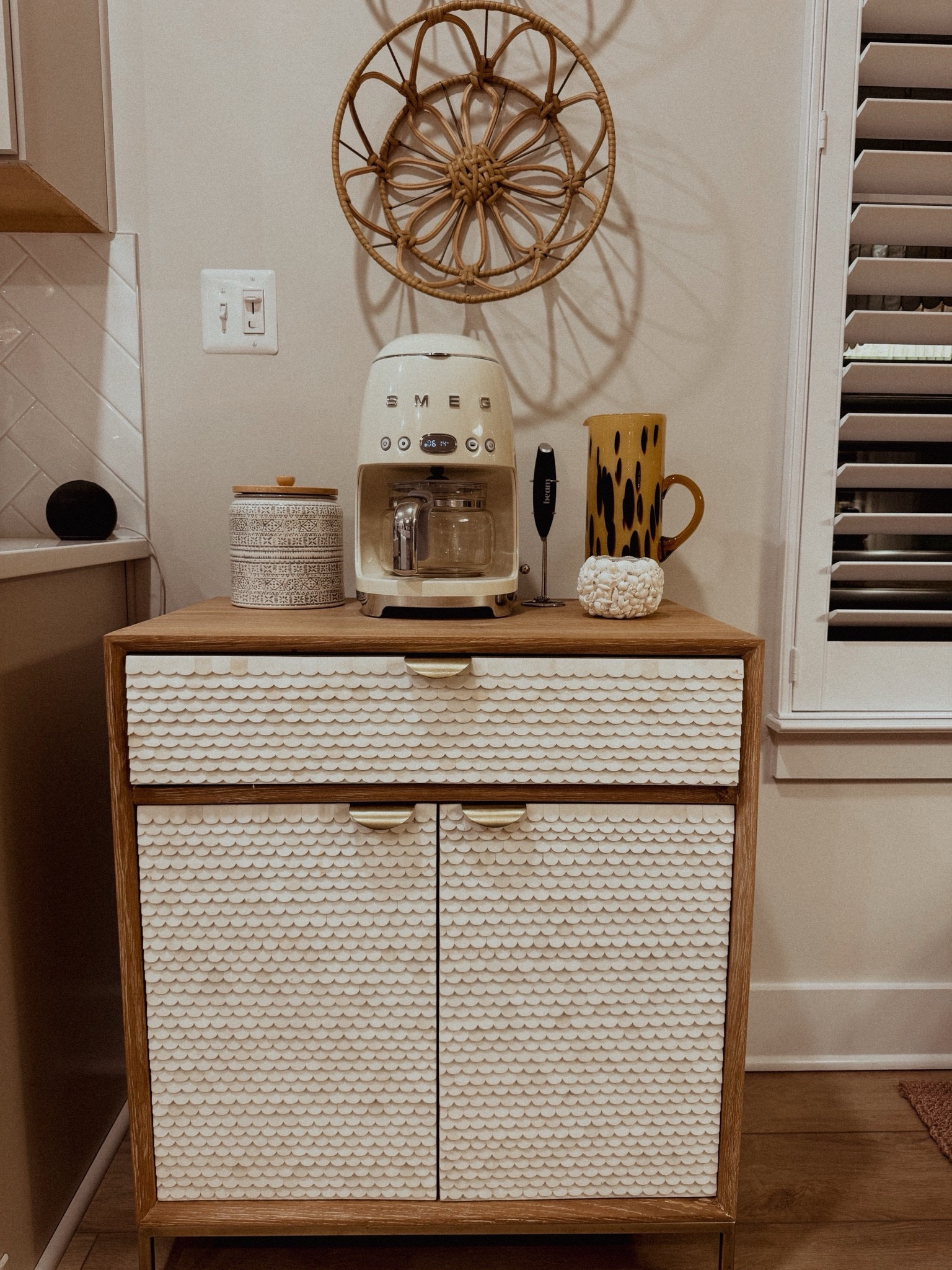 Coffee bar set up ☕️✨ I absolutely love this scalloped detail cabinet from Anthropologie! Linking my coffee machine and more 〰️

anthro home, Anthropologie home, home furniture, kitchen decor, kitchen set up, smeg coffee maker, coastal home decor

#LTKHome