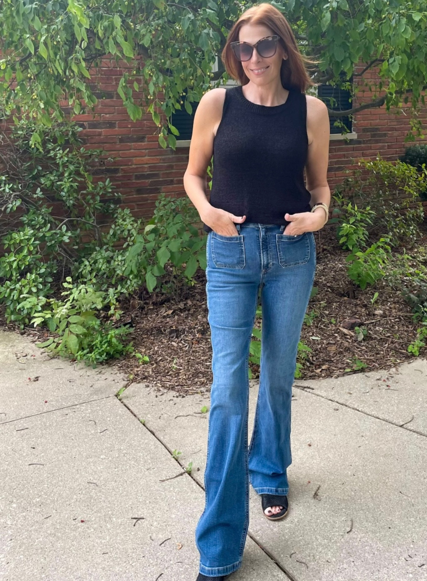 My wide leg Gap jeans are on sale! This is a go to look for me in warmer months!! Super old sleeveless sweater. Linked up a few similar. All on sale.

#LTKsalealert