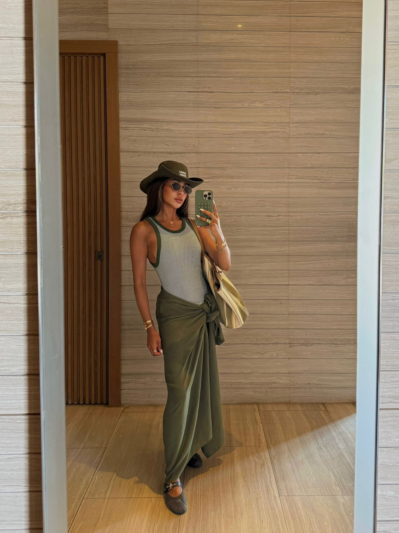 Summer outfit/ PrettyLittleThing/ khak sarong/ striped tank top in green/ beach outfit/ holiday/ euro summer/ outfit idea  

 #LTKuk #LTKAroundTheWorld #LTKsummer