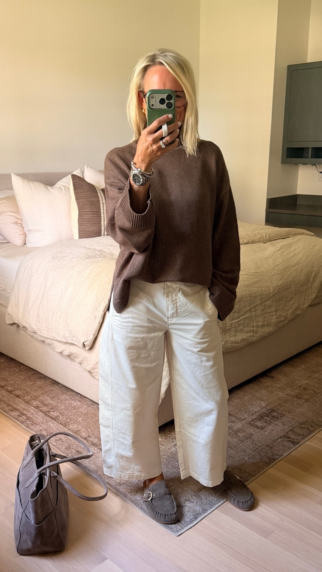 I love how this sweater makes a simple outfit feel a little more polished. The rich brown color and relaxed shape work beautifully with these white wide-leg pants, and the loafers keep the whole look comfortable and classic.

This is such an easy outfit for those cooler or in-between days, simple pieces that can be mixed into so many other outfits, too.

#LTKootd #LTKgrwm #LTKOver40