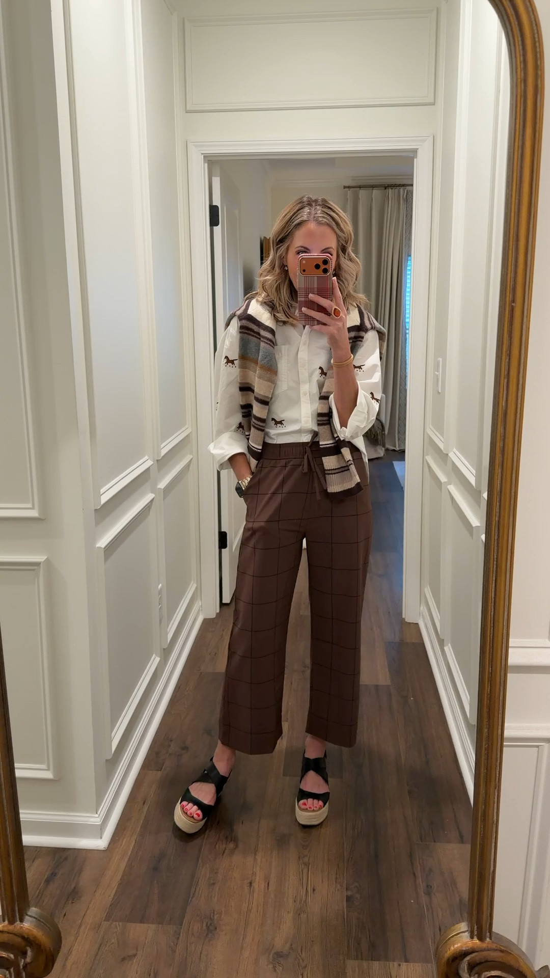 Today’s outfit of the day was inspired by my friend Hannah because the second she shared this Anthropologie shirt, I knew I needed it! Yes, it’s a splurge, but it’s one of those pieces I know I’ll wear over and over again. Paired it with my Albion pants—the fit is SO good and they’re perfect for running errands but can easily be dressed up. Then I added an Abercrombie sweater for that third-piece detail that just pulls the whole look together. Classic, comfy, and easyexactly how I like my everyday style at 50. @abercrombie  @Albion Fit @Anthropologie