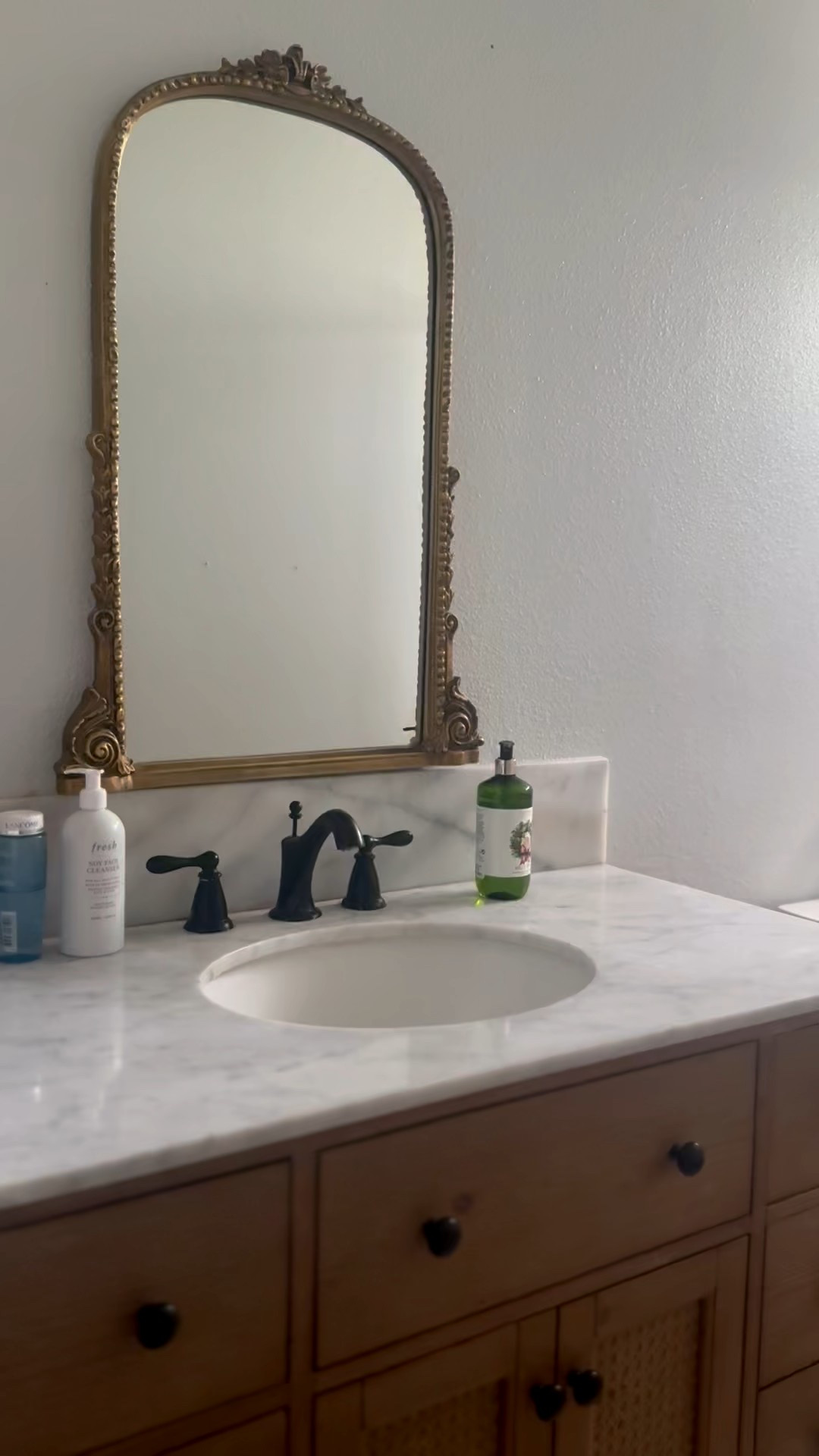 My Anthropologie gold ornate mirror is 30% off for Cyber Monday! It looks great in my guest bathroom! I remodeled it a few years ago, and love this beautiful vanity that is also on sale!! ❤️ 

#LTKSaleAlert #LTKHome #LTKCyberWeek