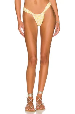 Stone Fox Swim Bijou Bikini Bottom in Banana Le Fleur from Revolve.com | Revolve Clothing (Global)