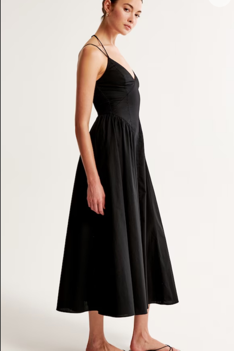 Black drop waist dress with midi length skirt 

#LTKSeasonal #LTKstyletip #LTKunder100