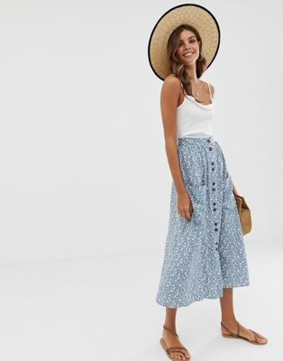 ASOS DESIGN button front midi skirt with pockets in blue floral print | ASOS US