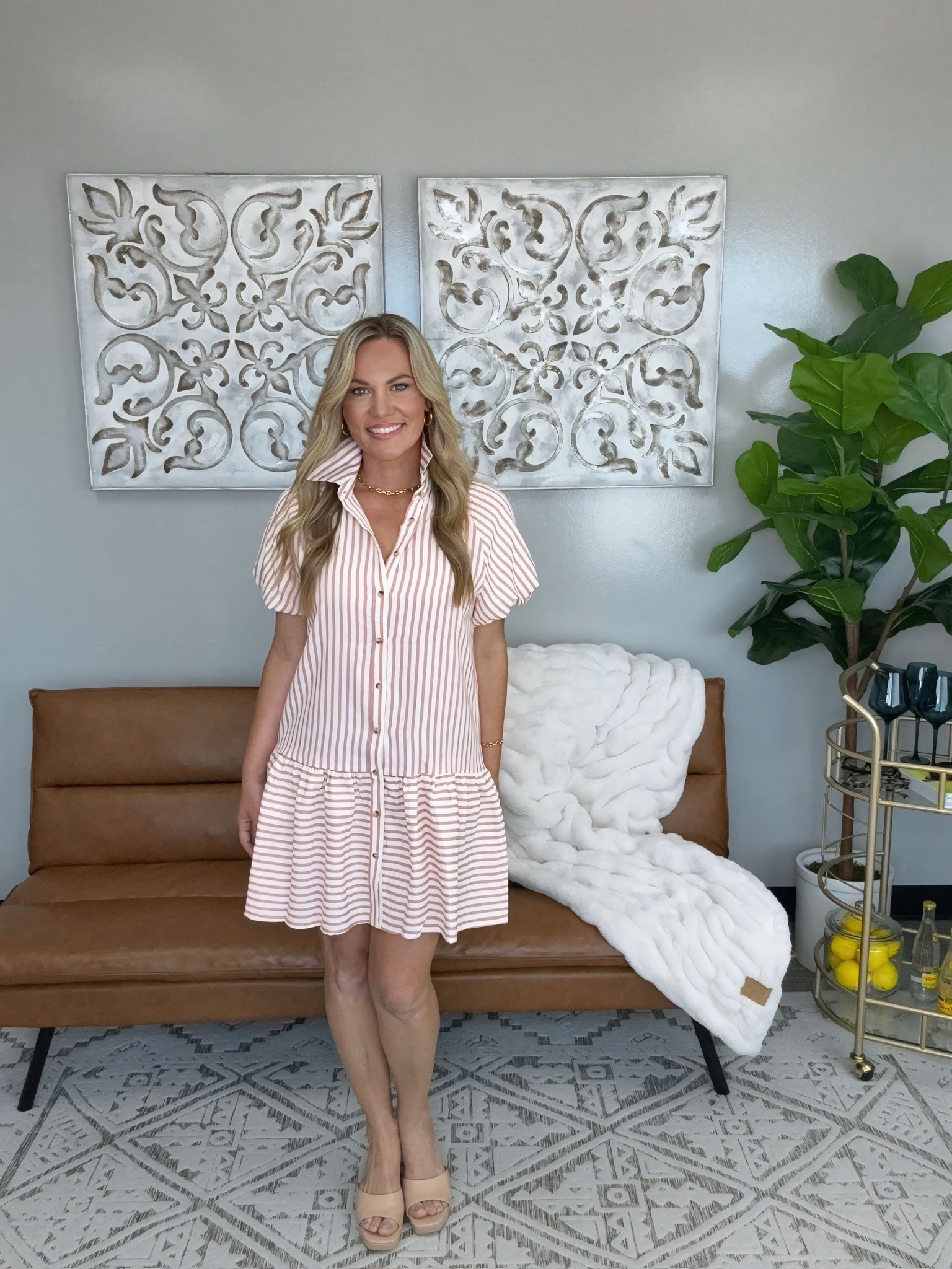 The statement collar and soft pink stripe give this dress a polished, feminine feel while the relaxed silhouette keeps it comfortable and easy to wear. The drop waist detail adds movement and shape, making it a great option for brunch, showers, vacations, and casual office days. Styled with neutral wedges and gold jewelry for an elevated finish.

Sizing:
• Dress: Small
• Wedges: Size 7.5

pink striped dress, collared dress, striped shirt dress, drop waist dress, feminine style, brunch outfit, baby shower outfit, vacation outfit, resort wear, summer dress, spring style, office outfit, neutral wedges, polished outfit, classic fashion, elevated everyday style, boutique fashion, women’s fashion, AudrieDollins

#LTKOver40 #LTKWorkwear #LTKootd