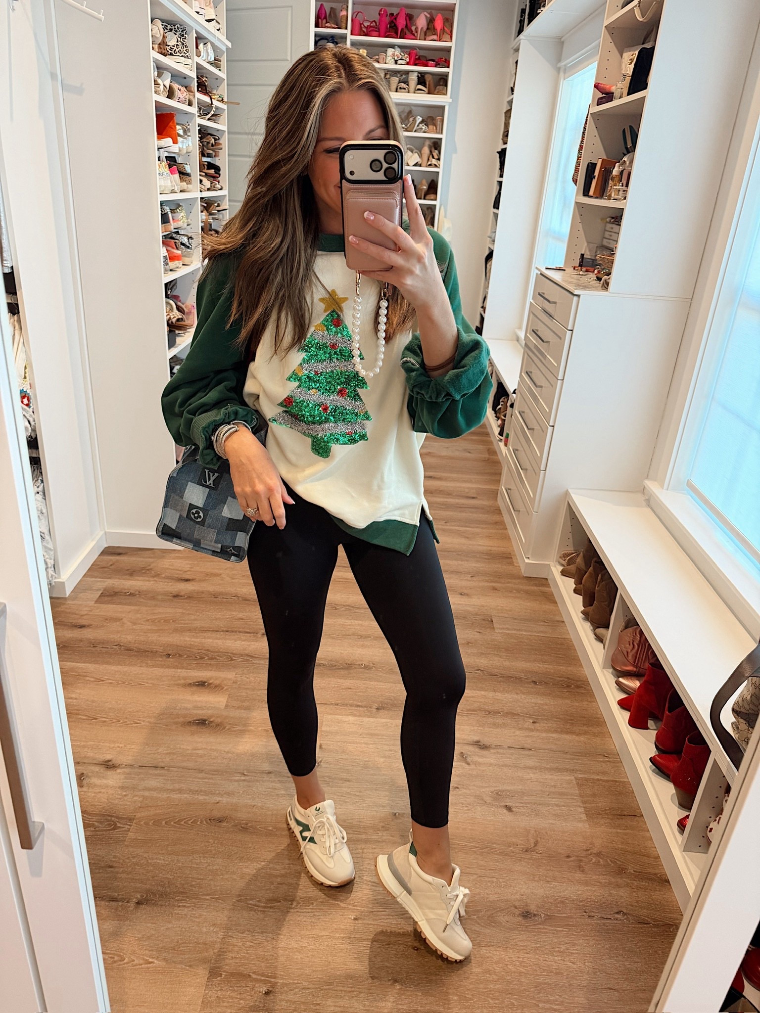 Love a festive casual outfit for running errands! In a medium Christmas tree sweatshirt, small leggings, sneakers and accessories - fits tts.

#LTKootd #LTKSeasonal #LTKHoliday