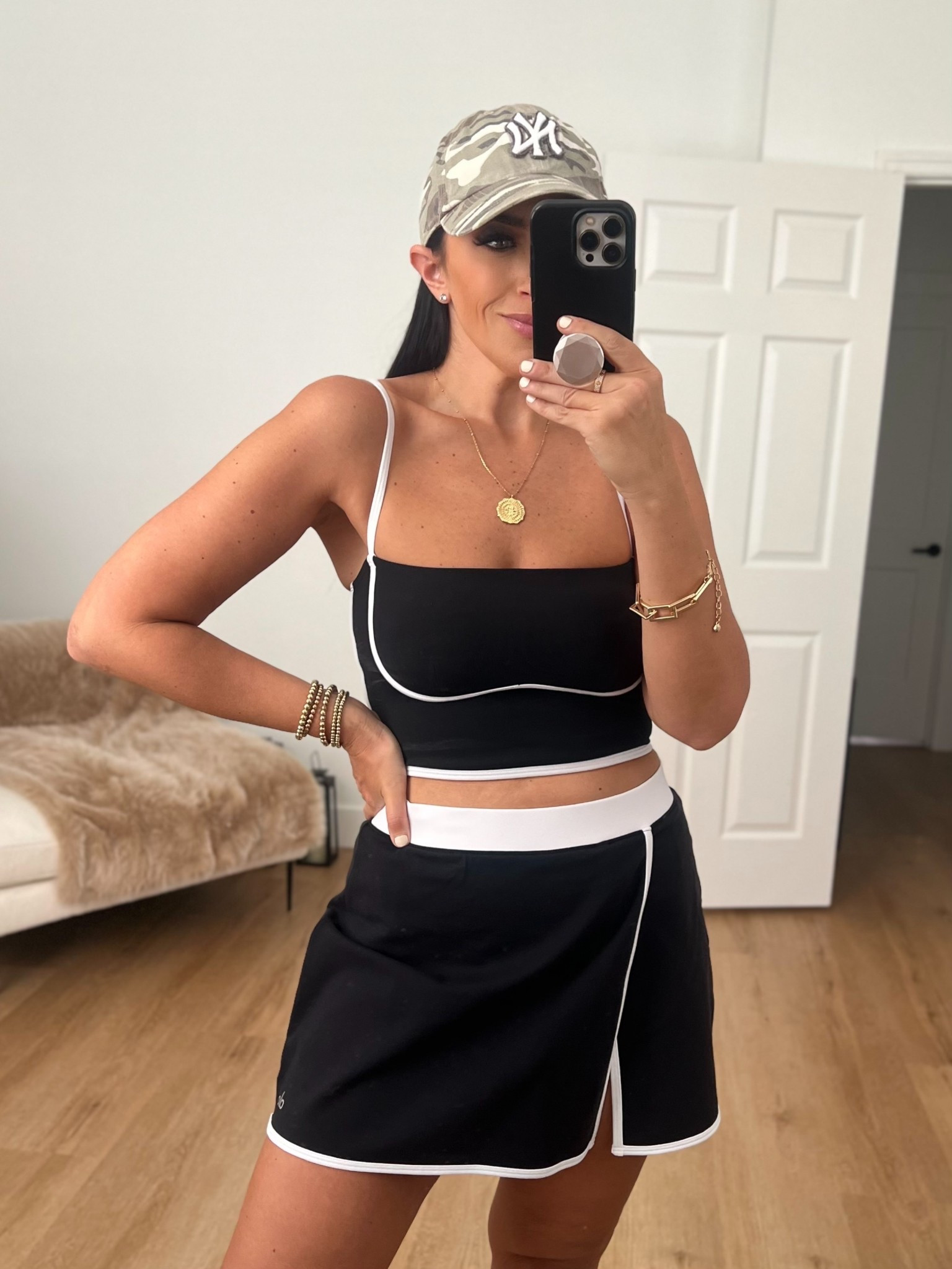 Airbrush Streamlined Skirt wearing size medium. Airbrush Streamlined Bra Tank wearing size medium. 
