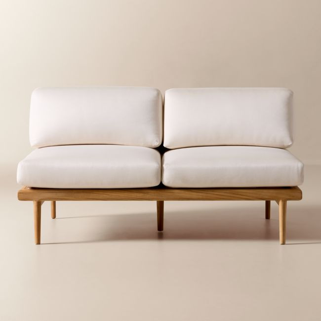 Tide Teak Outdoor Armless Loveseat With Ivory Sunbrella® Cushions | CB2