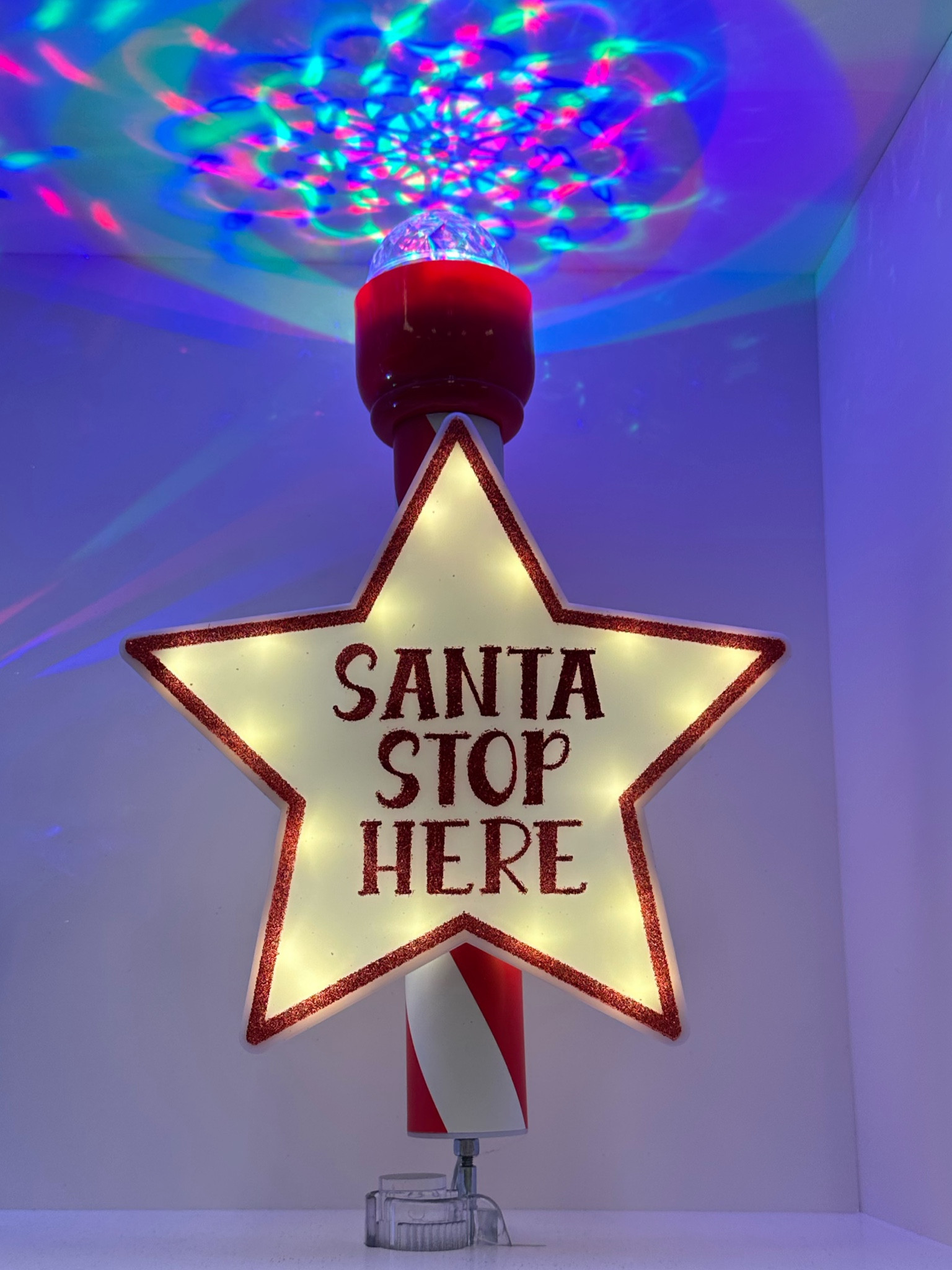 This tree topper was so fun!!!  It lights up the whole ceiling like a kaleidoscope!  Kids would love this if they have their own trees. 

#LTKHoliday #LTKKids #LTKHome