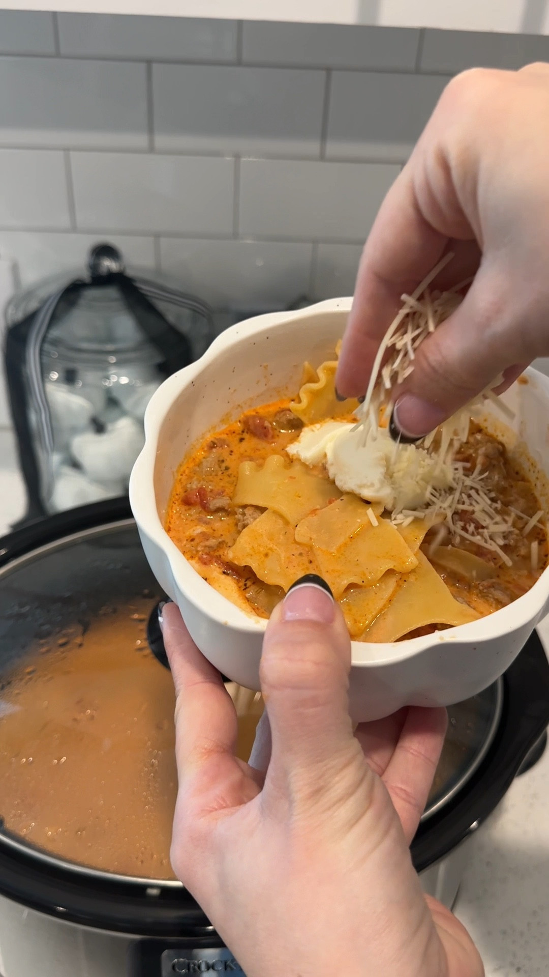 Lasagna soup in the crockpot!

Ingredients:
* 1 lb cooked ground turkey or beef
* 1 24-oz. jar marinara sauce
* 1 onion chopped
* 1 14-oz. can diced tomatoes
* 1 32-oz. container chicken or beef broth
* 1 spoonful minced garlic
* 1 tsp onion powder
* 1 tsp italian seasoning
* 1 tsp cajun seasoning
* Sprinkle of red pepper flakes
* 1 cup heavy cream
* 10-12 lasagna noodles 
Optional toppings :
* Ricotta cheese
* Parmesan cheese or mozerella

1. Add in your marinara sauce, cooked ground turkey (or beef), chopped onion, broth & seasonings. Stir and cook on high for 3-4 hours.
2. Add in your heavy cream and lasagna noodles. Cook for an additional 30 minutes on high.
3. Pour in bowls and top with your favorite cheeses

Fall recipe, fall soup, crockpot, fall decor

#LTKHome #LTKSeasonal #LTKVideo