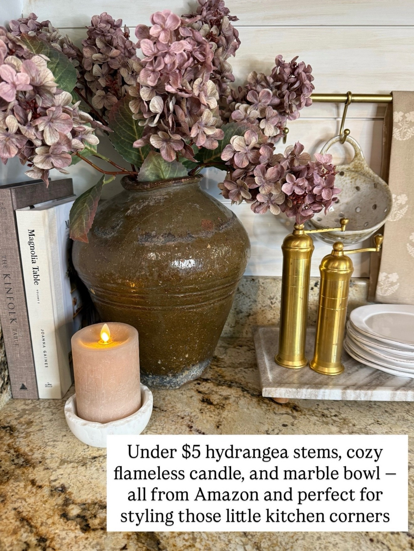 Affordable Kitchen Counter Decor with Faux Hydrangea Stems

Follow @farmtotablecreations on Instagram for daily home finds & styling ideas.

I love styling those little kitchen corners with simple, budget-friendly pieces that still feel warm and intentional. These faux hydrangea stems are under $5 each for such a full, realistic look, paired with a cozy flameless candle and a marble bowl that adds just the right amount of texture. All easy Amazon finds that layer beautifully on countertops, shelves, or coffee bars without feeling cluttered.

#kitchendecor #countertopdecor #amazonhome #fauxflowers #homedecor #kitchenstyling #neutraldecor #marbledecor

#LTKFindsUnder50 #LTKSaleAlert #LTKHome