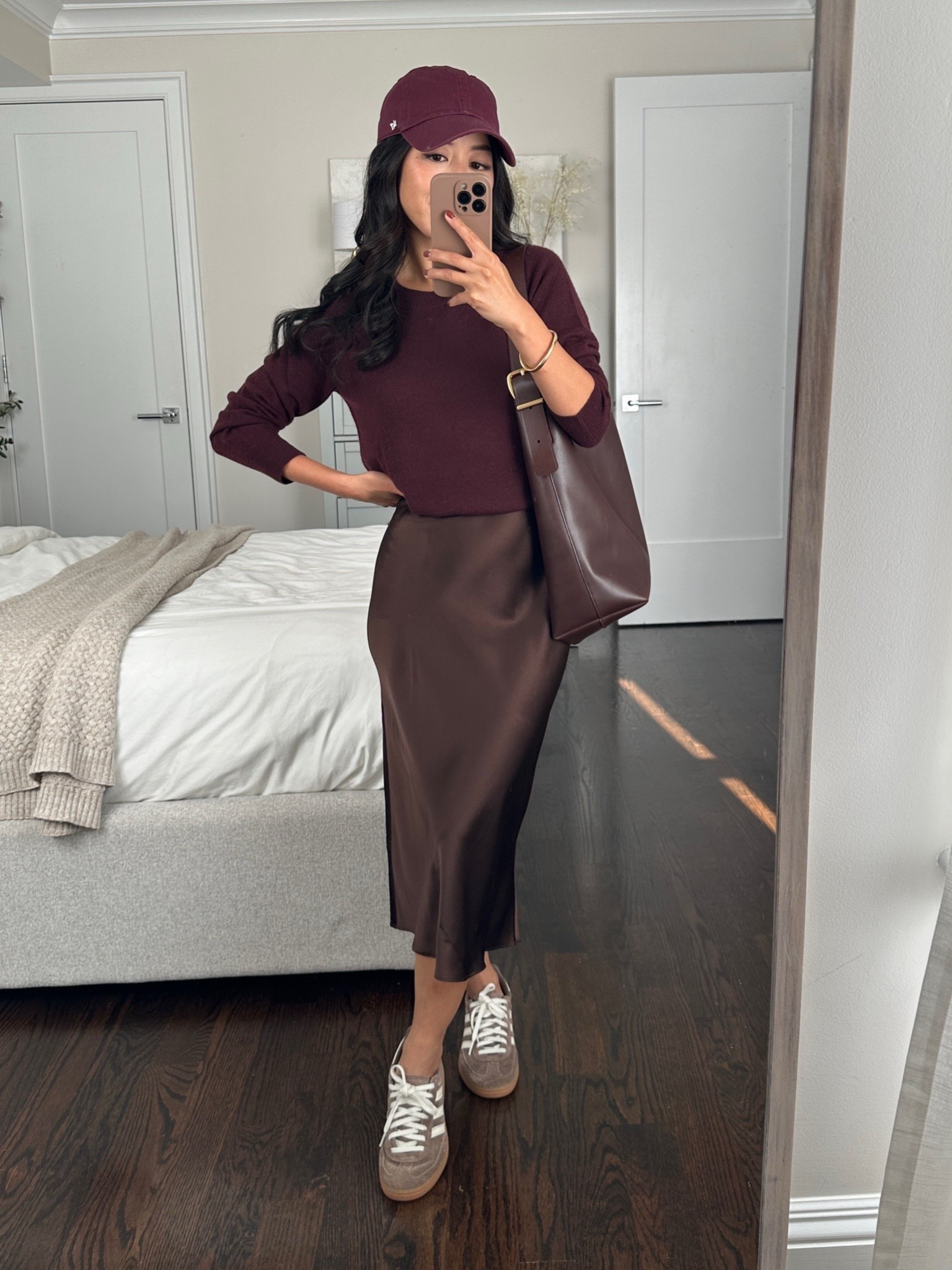 Love this color combo 🤎 Burgundy & chocolate brown, elevated casual fall outfit
 
• Quince silk chocolate brown slip dress xs worn with a tucking band to keep sweater up. 

Or, easier to do the slip skirt version in xs linked and half tuck the sweater or wear untucked . The skirt is a good midi length for petites 

• Quince affordable cashmere sweater Xs in rich burgundy 
 
• adidas sneakers size 5, this style runs half size big

• 47 cap

Mom on the go, school drop off, easy fall outfit ideas 

#LTKTravel #LTKPetite #LTKStyleTip