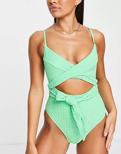 River Island cutwork wraparound tie front swimsuit in green | ASOS (Global)