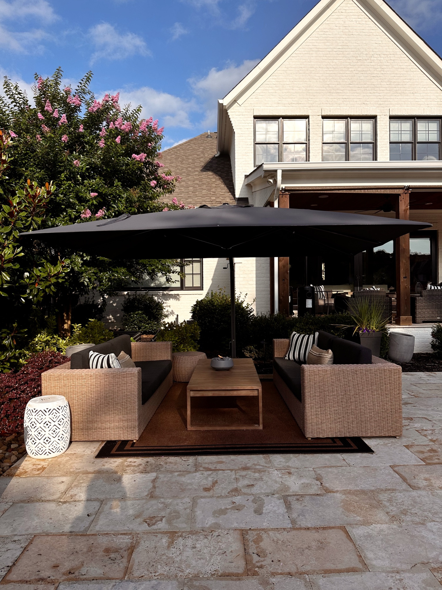 Outdoor Oasis for summer updates! Loving this GIANT umbrella that can be purchased with a base or we opted for a concrete foundation so it’s so sturdy! 