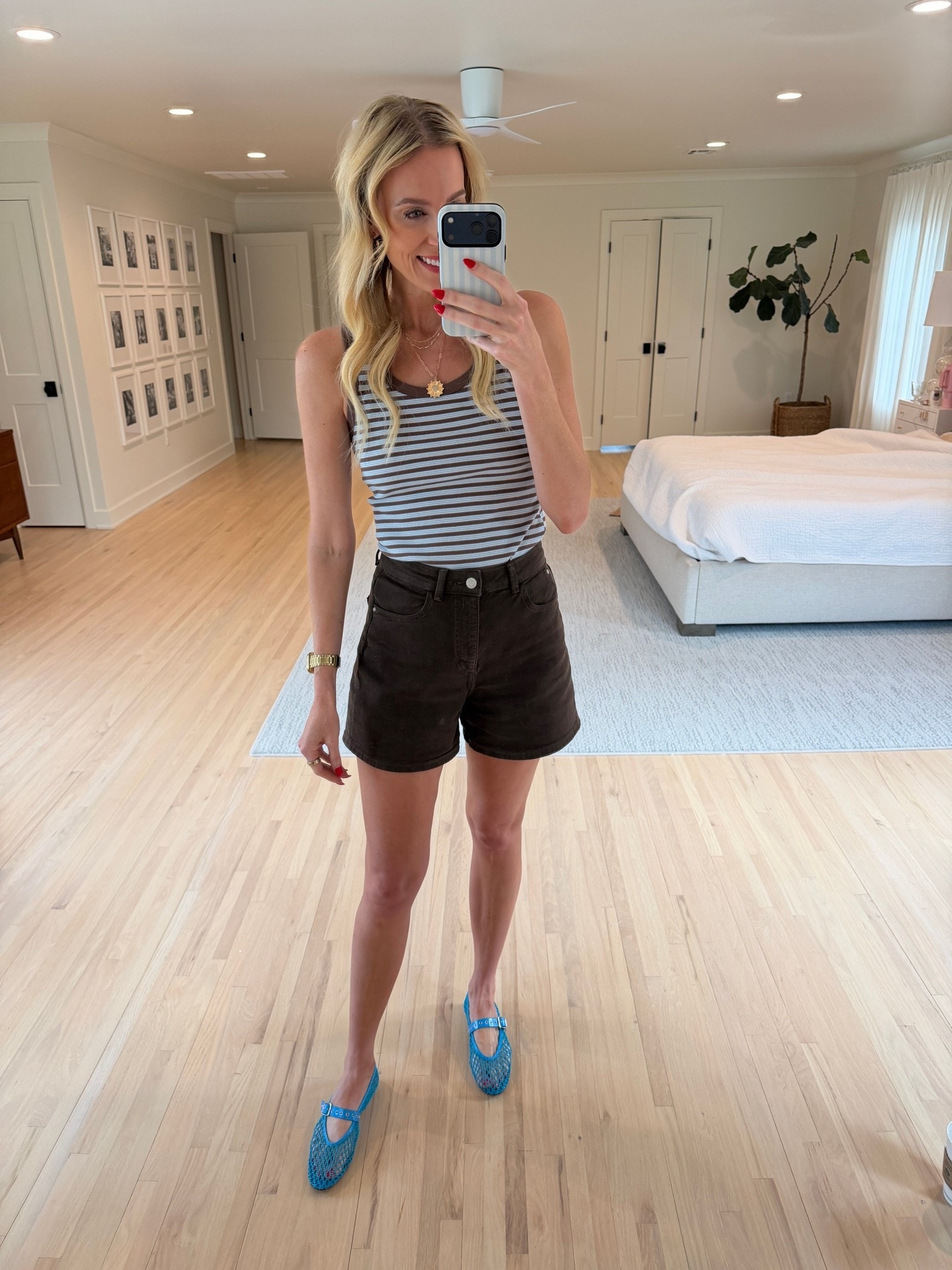 I love this striped tank top with these brown shorts. Shorts are old from Zara, but I’m linking tank top and shoes which are on sale! ￼
