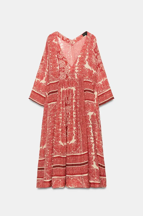 ZARA WOMAN COLLECTIONDress made from a viscose blend yarn. Featuring a V-neckline and elbow-lengt... | Zara UK