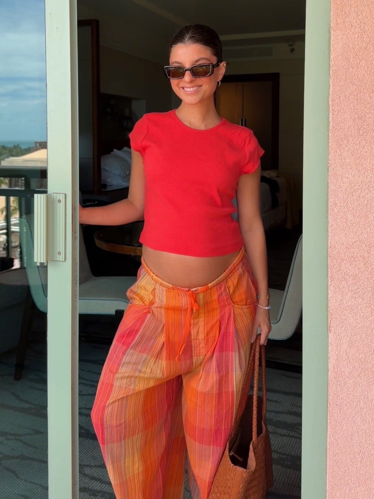 [4/14/26] these pants are sold fun and perfect for a warm weather vacation 🌞 wearing xs in bottoms and paired with baby tee from the Annette tee skirt set in size small. Both available in multiple colors! Also linking other red baby tee options. 

sizing details:
• yellow carmen set - small 
• red baby tee (comes as a full Annette skirt set) - small 
• red pull on pant - xs
• cotton linen midi dress - small 
• green printed maxi - small 
• white keep it cool set - xs
• yellow Bristol skirt set - small 
• green maxi skirt set - xs

#LTKSeasonal #LTKSwim #LTKBump