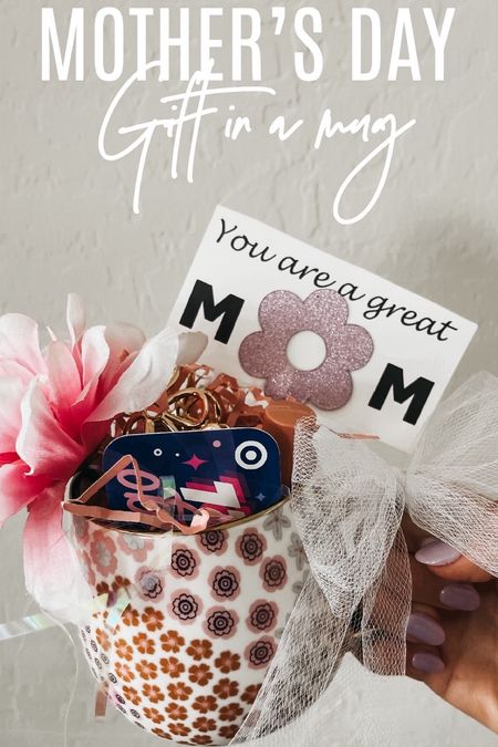 Mother’s Day gift in a mug! 🌸☕️ Cutest floral, coffee mug with gold handle ☕️pink paper shred, best drugstore lipgloss, prettiest, gold floral claw clip, target gift card and a DIY gift tag using a flower pic and cardstock! 

#LTKsalealert #LTKGiftGuide #LTKfamily