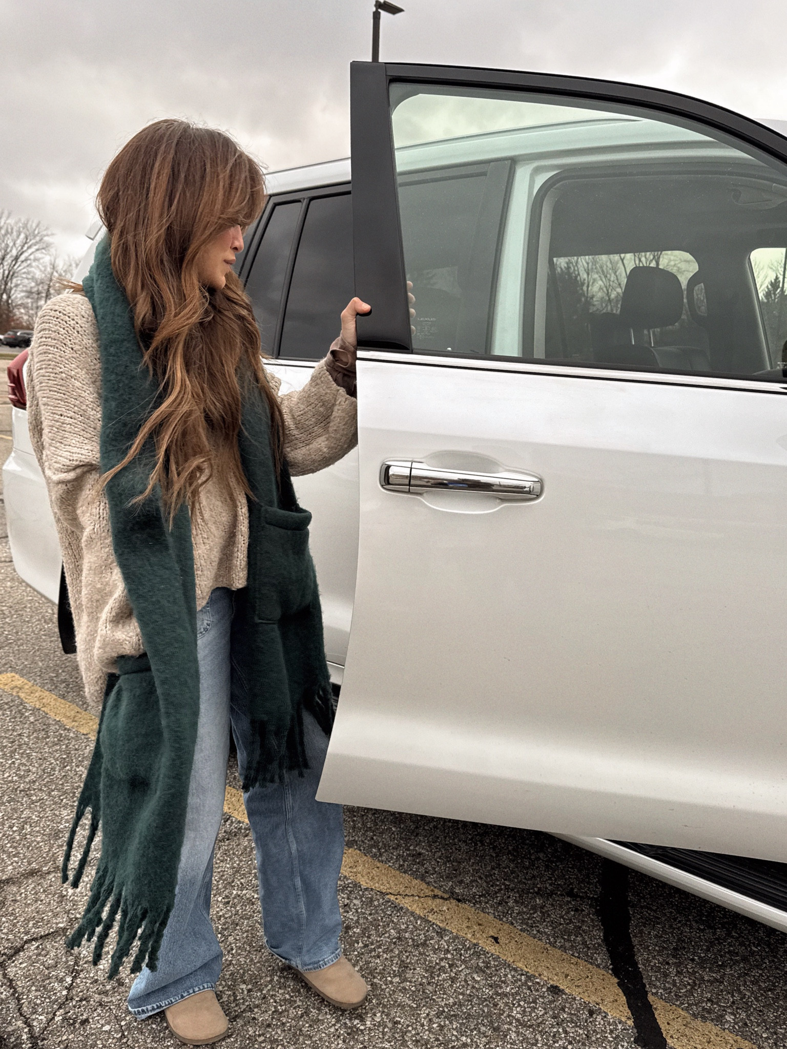 Off to the movies 🍿 wearing a scarf that feels like a blanket to snuggle up with & the best part?!  It has pockets!!! Such a great gift idea too! I also included some great sweater options similar to mine to get that oversized cozy look. 

#LTKSeasonal #LTKGiftGuide #LTKHoliday