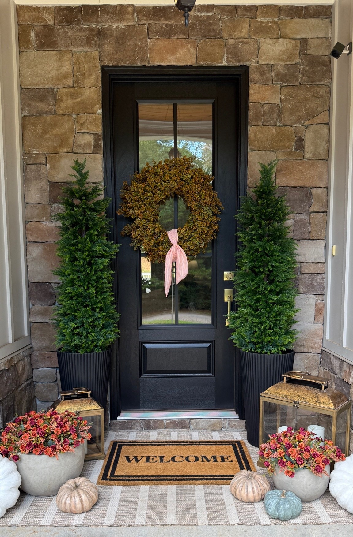 How we decorated our front porch and front door for fall 🍂 A pop of autumnal colors, some cozy lantern accents, and a new seasonal wreath. Small upgrades that feel perfect for this time of the year!

#LTKHome #LTKSeasonal
