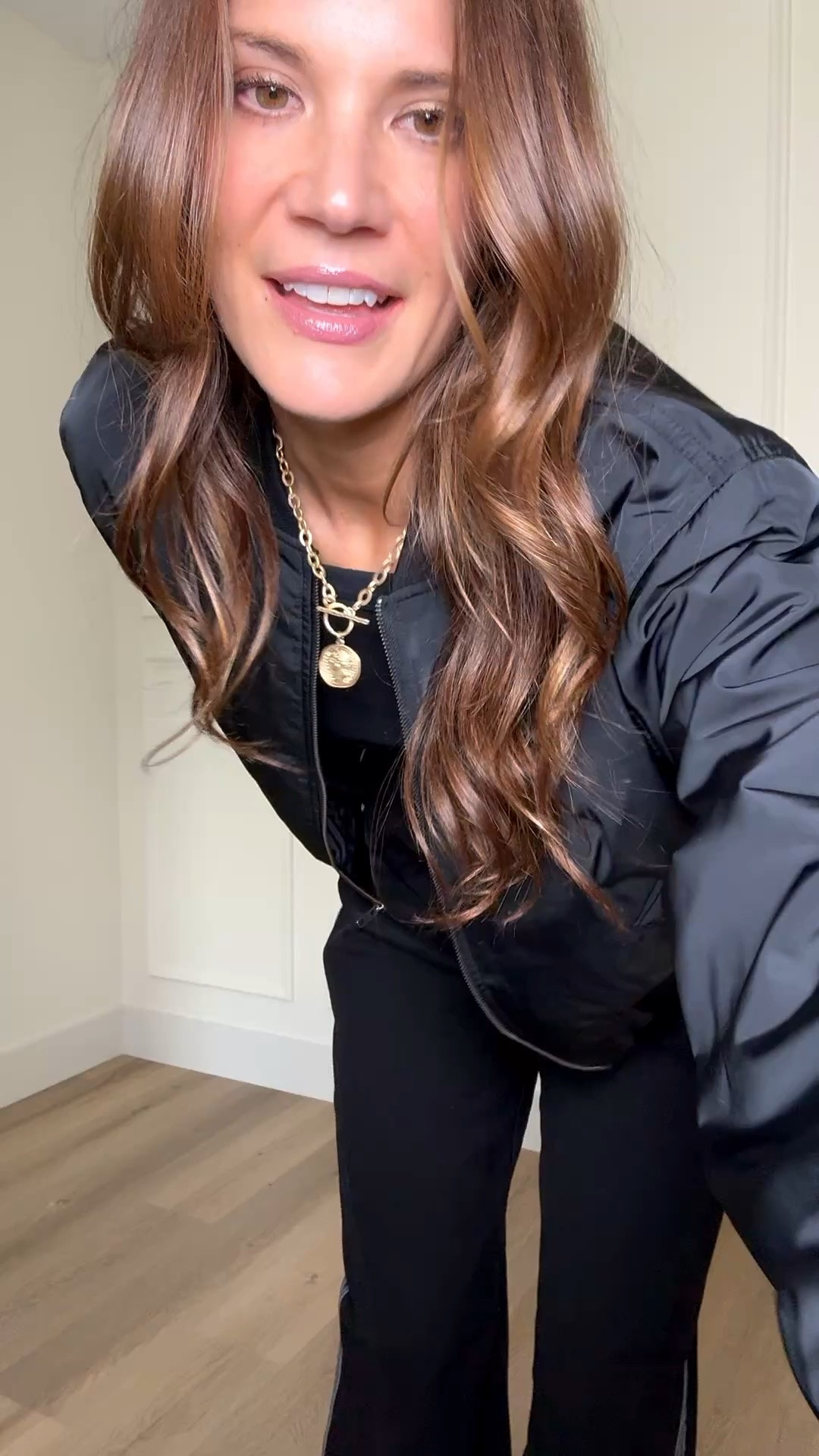 Sporty outfits have been my go to lately and this one is so good. The striped pants make it feel trendy and elevated, and I love the oversized bomber jacket layered over all black basics.

Sporty chic outfit, bomber jacket outfit, striped track pants, casual everyday outfit, airport outfit idea, elevated athleisure, comfy travel outfit, black monochrome outfit, trendy mom style, cool girl casual outfit, everyday street style, sporty fashion outfit, relaxed fit pants, casual spring outfit, Stang and Co

#LTKootd #LTKSeasonal #LTKTall