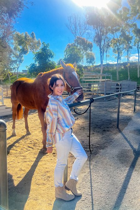 Neigh neigh! Happy Sunday! I was riding away and hanging with horses the other day. Horses heal broken wounds. Horses have the healing and companionship kind of love. They know how to listen to you when you need a little pick me up! 🍎 I linked my 7 for mankind jeans down below alongside my Urban Outfitters oversized striped button down blouse here down below. 