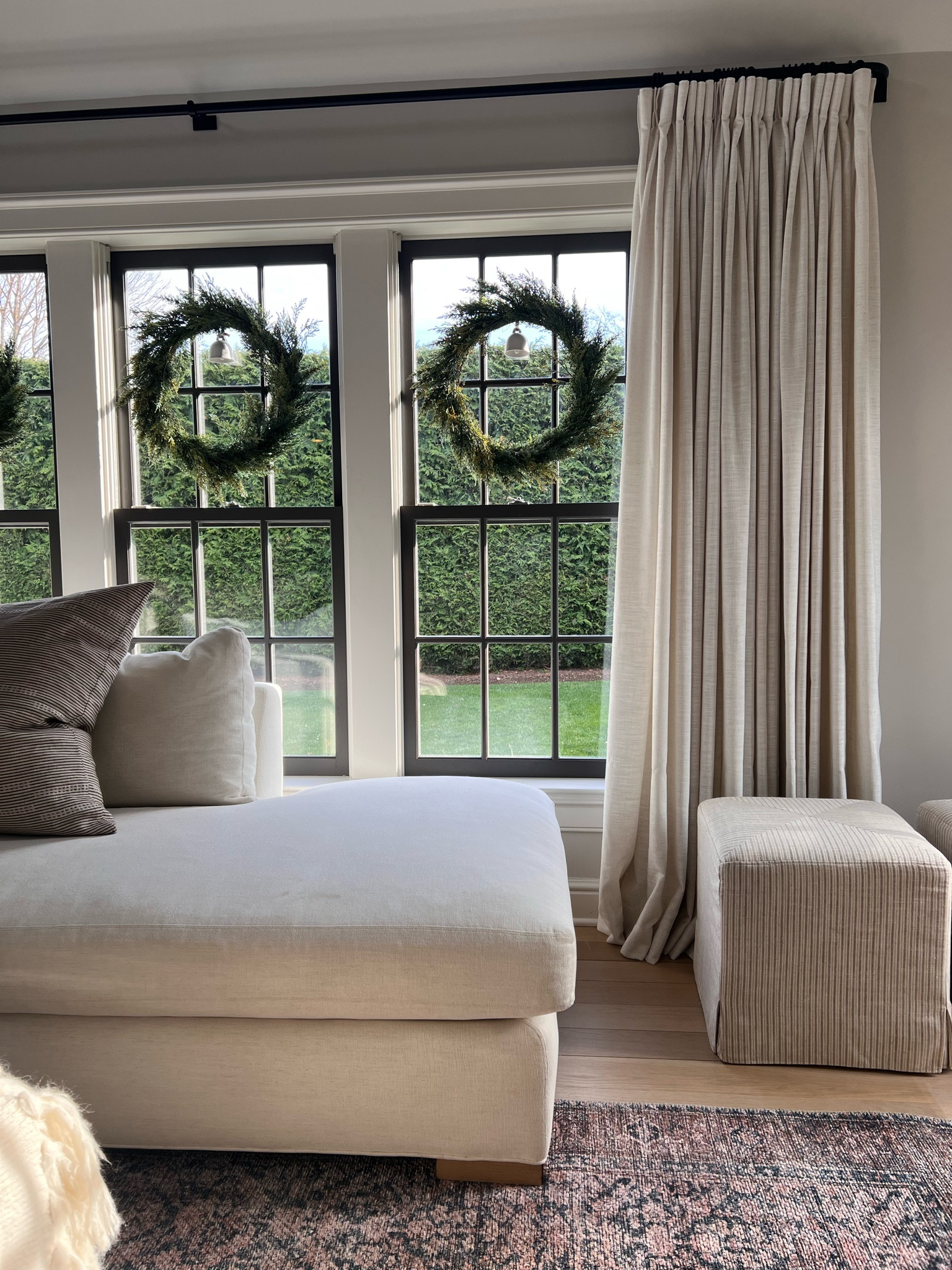 Faux wreaths hung with command hooks 

#LTKHoliday #LTKhome #LTKSeasonal