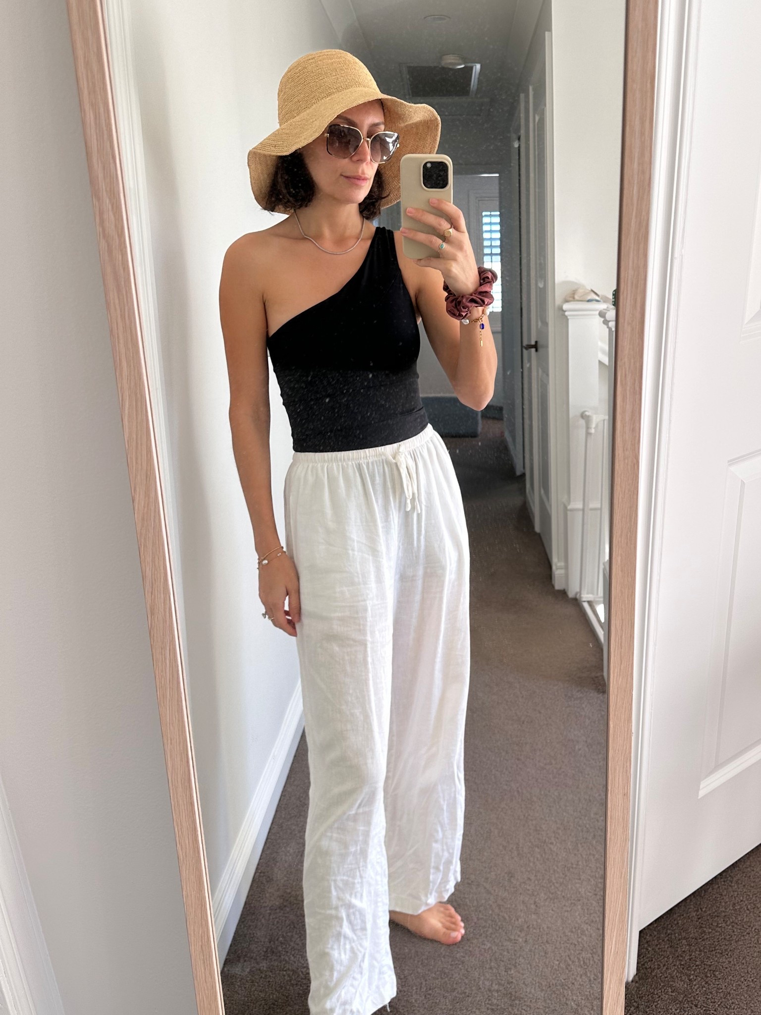 Black off shoulder one piece swimsuit and white linen pants. 

#LTKtravel #LTKaustralia #LTKswimwear