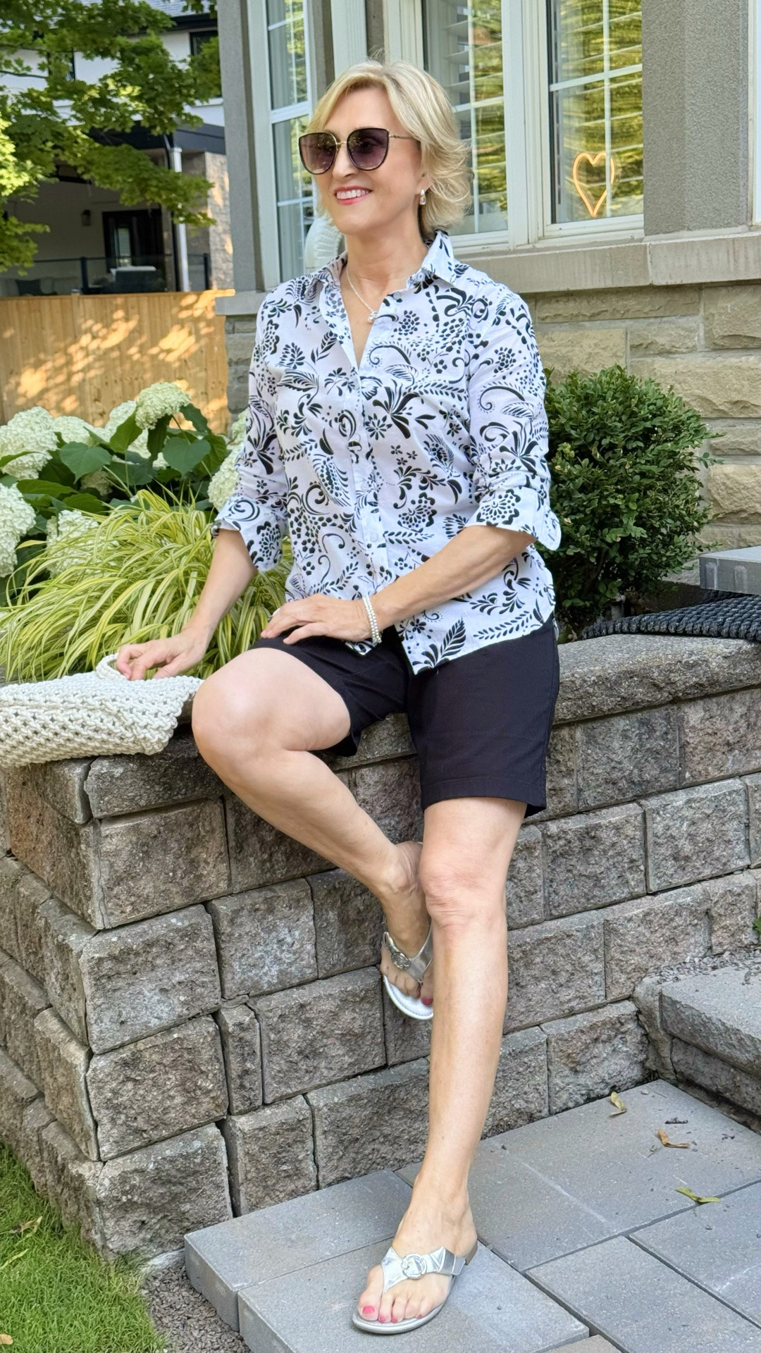 I love how the black pattern on this white 3/4 sleeve shirt adds just enough interest, while the black shorts keep the look classic and effortless. Finished with silver sandals for a little shine, it’s the kind of outfit I know I’ll be reaching for on repeat.

Perfect for everything from a casual lunch to a day of shopping. ✨

#LTKOver40 #LTKSeasonal #LTKootd