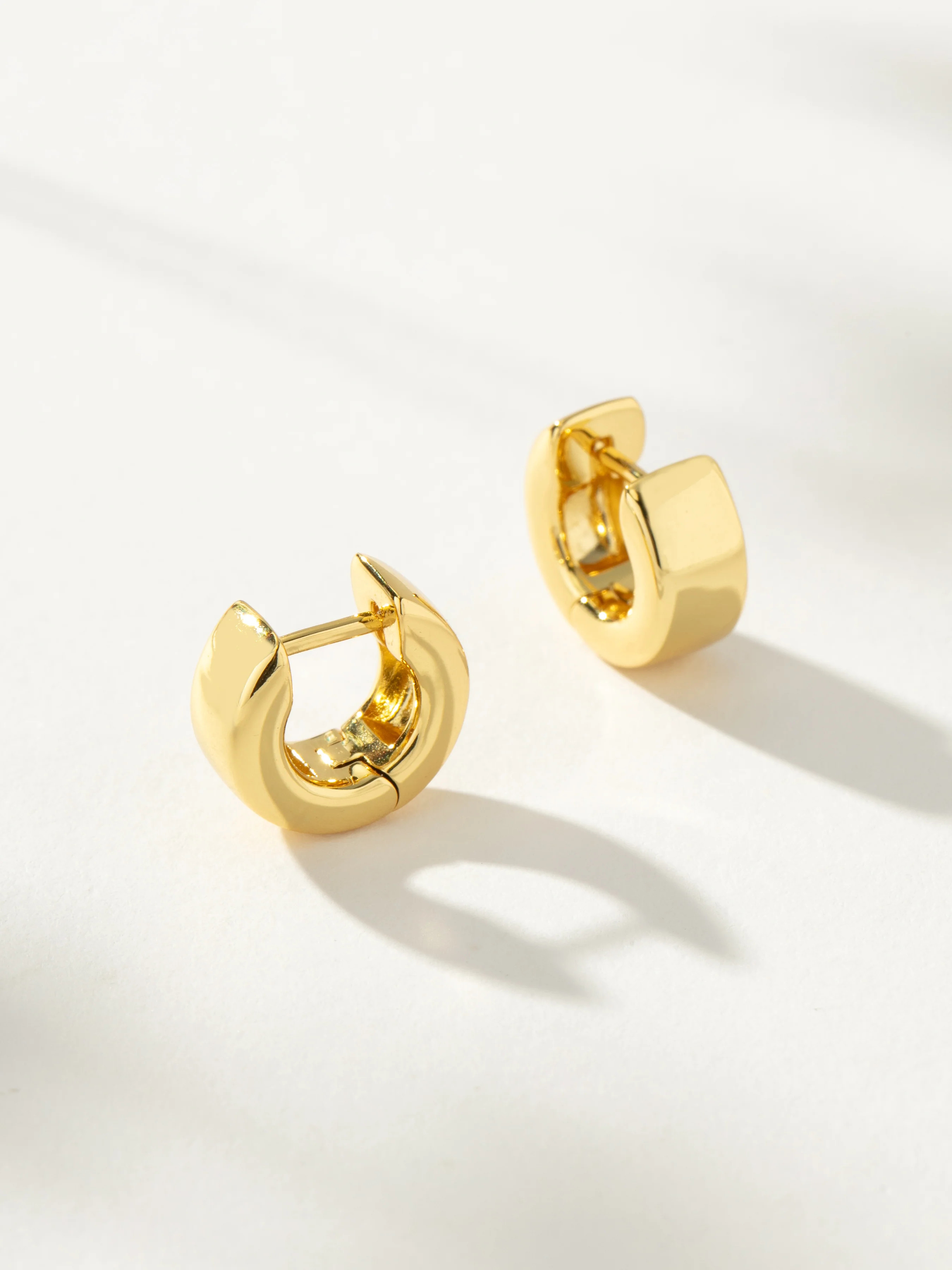 Little Thick Hoop Huggie Earrings in Gold | Uncommon James | Uncommon James
