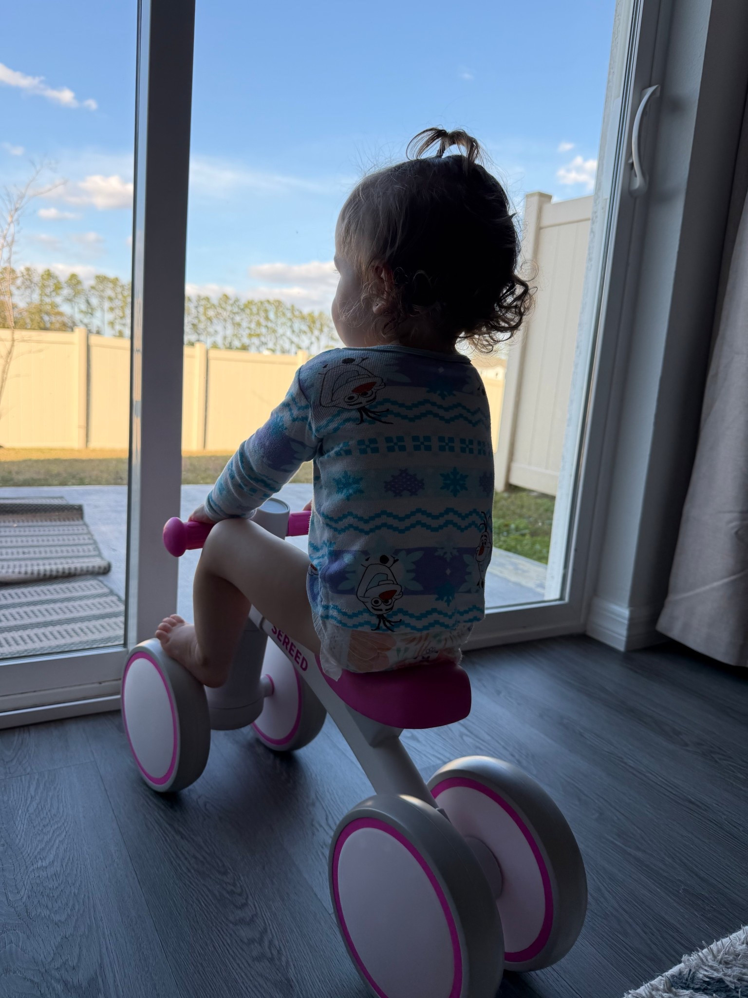 Sometimes you have to stop and smell the roses. Baby girl is starting to use her balance bike more and more 
.
.
#balancebike #toddlertoys #toddleractivities #toddler 

#LTKKids #LTKfitnessgoals #LTKmomlife
