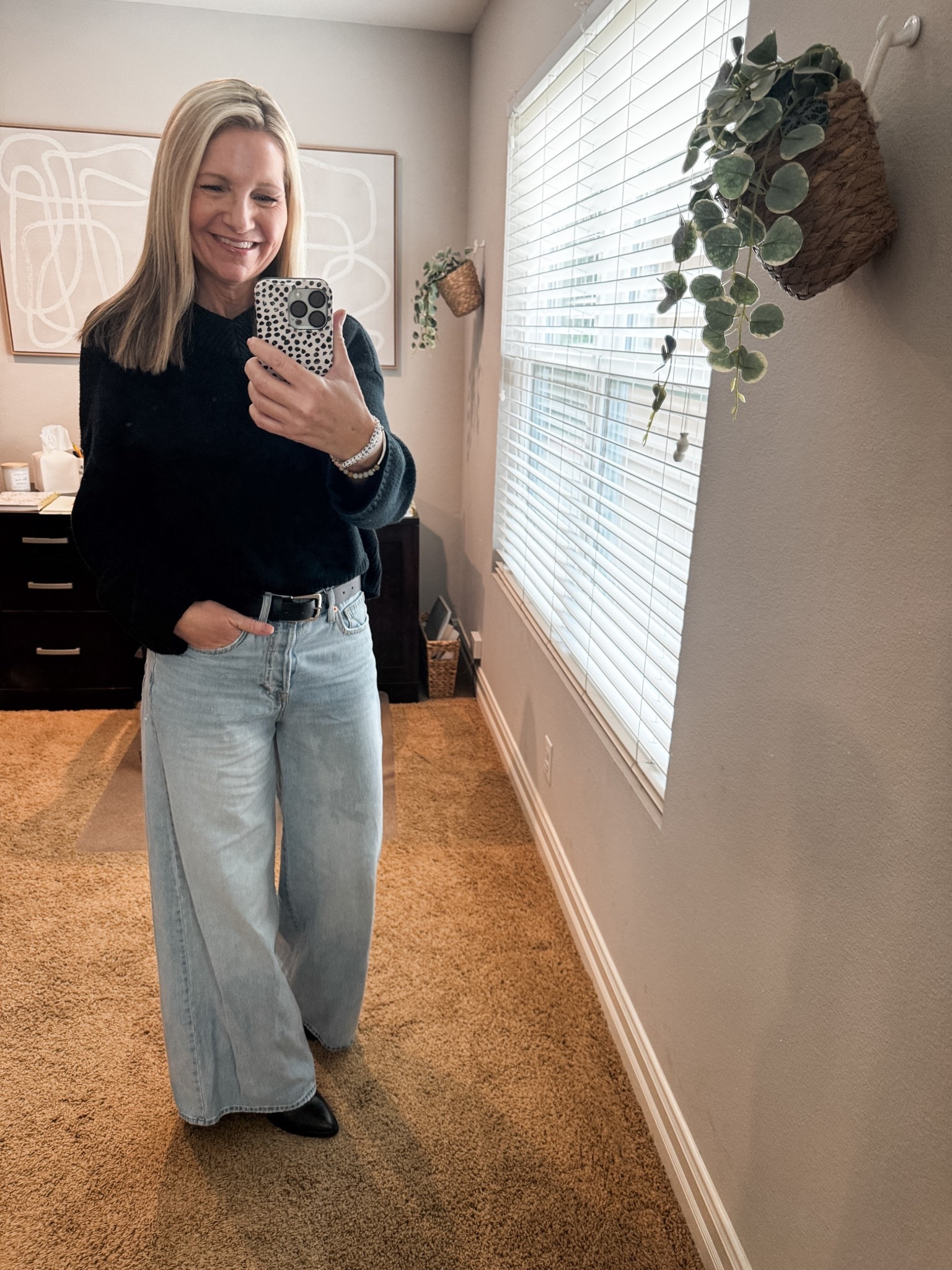 Friday casual outfit with a basic Gap black sweater and wide leg jeans. Sometimes basic combos are the best ones. My belt is Target and boots are old from Nordstrom. 

#LTKootd #LTKSeasonal #LTKOver40