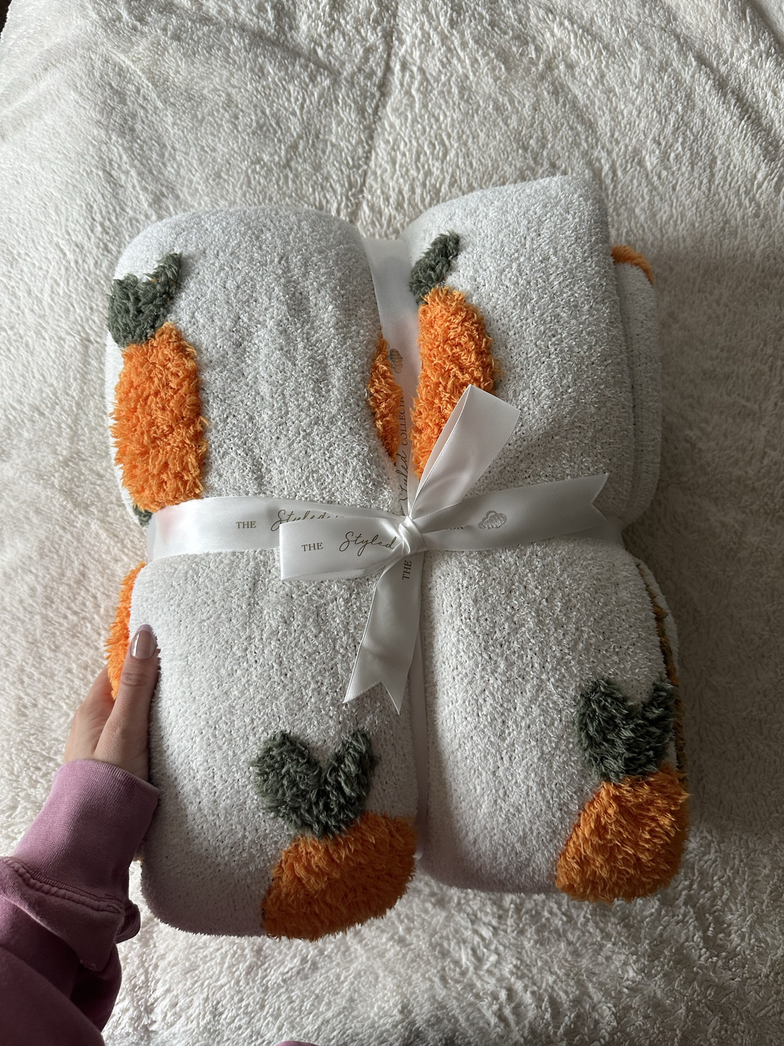 The SOFTEST blanket I have ever felt!!! EVER!!!! I’m seriously in love with this blanket & look at the little oranges. 🍊🥹🥰  + it’s on sale!

#LTKSpringSale #LTKhome